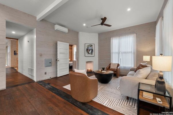 Fireplace, Interior, Living room, Recessed Lighting, Wood Texture Flooring, Wooden Walls