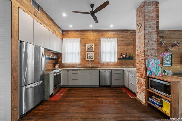 Interior, Kitchen, Recessed Lighting, Stainless Steel Appliances, Wood Texture Flooring, Wooden Walls
