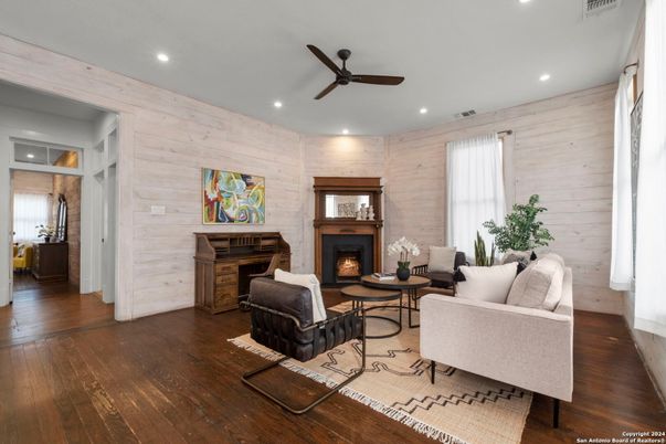 Fireplace, Interior, Living room, Recessed Lighting, Wood Texture Flooring, Wooden Walls