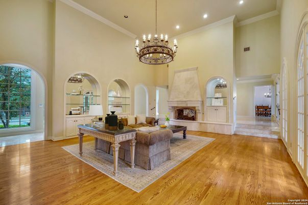 Chandelier, Fireplace, Interior, Living room, Recessed Lighting, Wood Texture Flooring