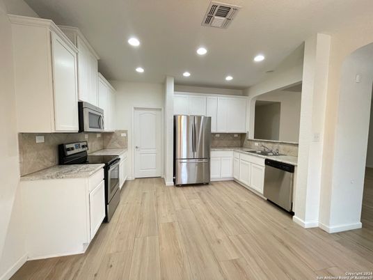 Interior, Kitchen, Recessed Lighting, Stainless Steel Appliances, Wood Texture Flooring
