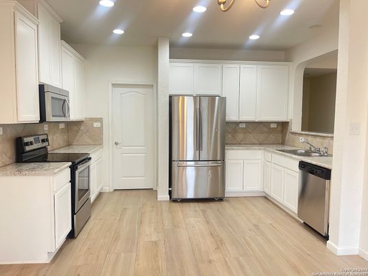 Interior, Kitchen, Recessed Lighting, Stainless Steel Appliances, Wood Texture Flooring