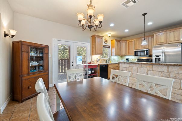 Chandelier, Dining room, Interior, Kitchen, Pendant Lights, Recessed Lighting, Stainless Steel Appliances