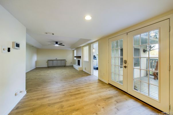 Empty room, Fireplace, Interior, Recessed Lighting, Wood Texture Flooring
