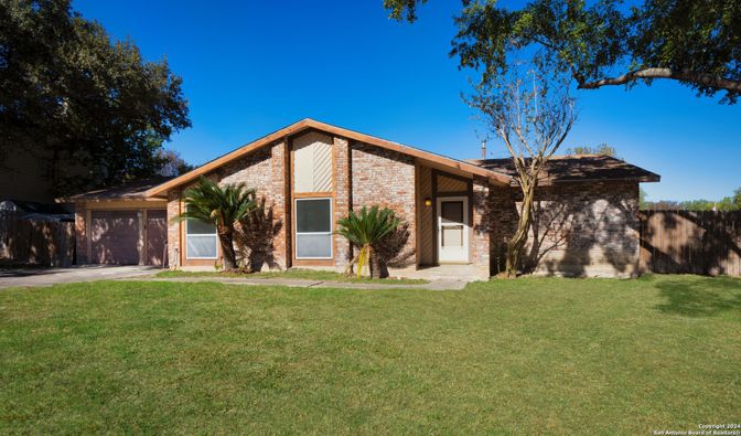 Attached, Backyard, Exterior, Facade, Brick Facade, Brick Traditional