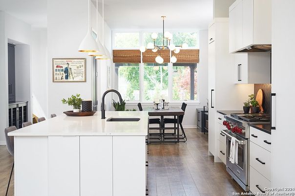 Chandelier, Dining room, Interior, Kitchen, Pendant Lights, Stainless Steel Appliances, Wood Texture Flooring
