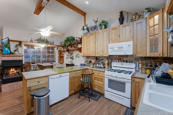 Fireplace, Interior, Kitchen, Recessed Lighting, Wood Texture Flooring