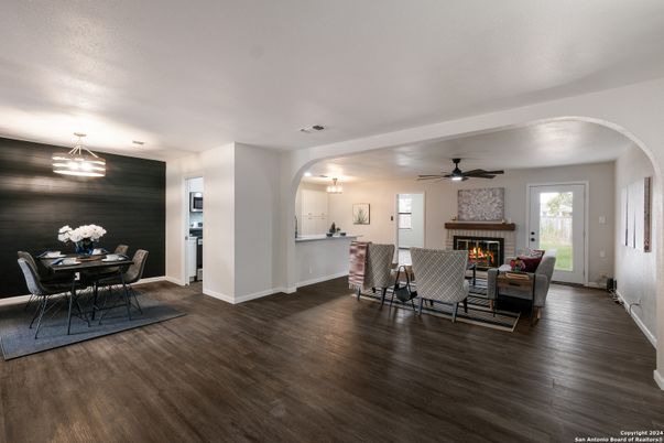 Dining room, Fireplace, Interior, Kitchen, Living room, Pendant Lights, Wood Texture Flooring