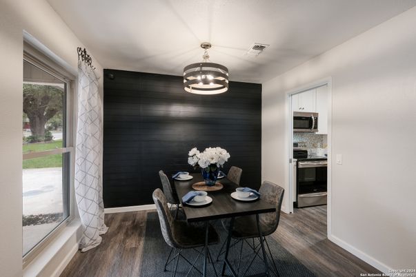 Dining room, Interior, Pendant Lights, Stainless Steel Appliances, Wood Texture Flooring