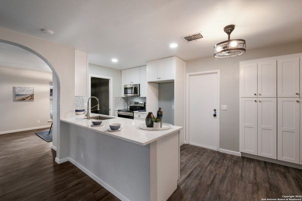 Interior, Kitchen, Recessed Lighting, Stainless Steel Appliances, Wood Texture Flooring