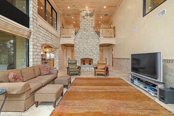 Fireplace, Interior, Living room, Recessed Lighting, Stone Walls, Wooden Ceilings, Wood Texture Flooring