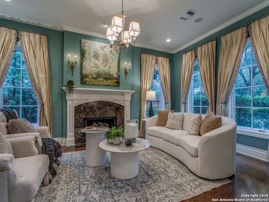 Chandelier, Fireplace, Interior, Living room, Recessed Lighting, Wood Texture Flooring