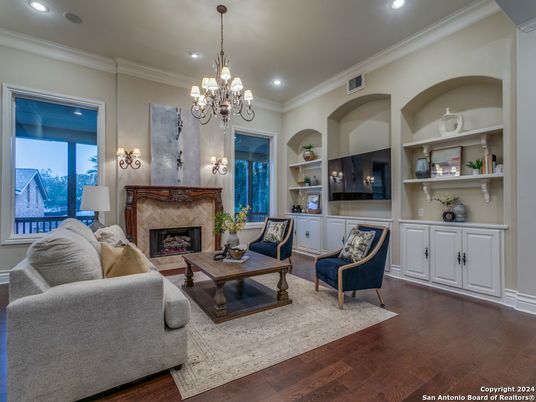 Chandelier, Fireplace, Interior, Living room, Recessed Lighting, Wood Texture Flooring