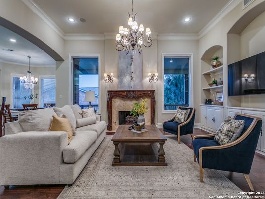 Chandelier, Dining room, Fireplace, Interior, Living room, Recessed Lighting, Wood Texture Flooring