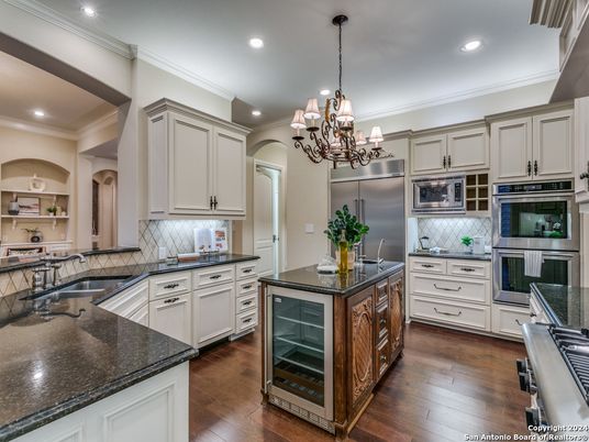 Chandelier, Interior, Kitchen, Recessed Lighting, Stainless Steel Appliances, Wood Texture Flooring