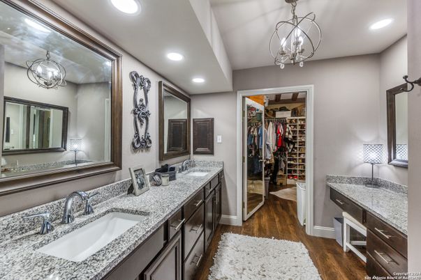 Bathroom, Dual Sink Vanities, Interior, Recessed Lighting, Walk-in Closets, Wine Storage, Wood Texture Flooring