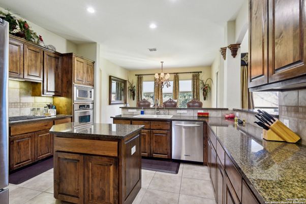 Chandelier, Dining room, Interior, Kitchen, Recessed Lighting, Stainless Steel Appliances