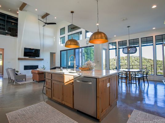 Dining room, Fireplace, Interior, Kitchen, Living room, Pendant Lights, Recessed Lighting, Stainless Steel Appliances