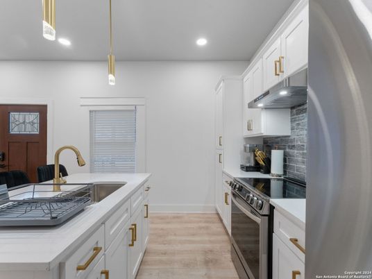Interior, Kitchen, Pendant Lights, Recessed Lighting, Stainless Steel Appliances, Wood Texture Flooring