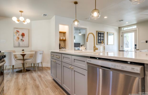 Dining room, Interior, Kitchen, Pendant Lights, Recessed Lighting, Stainless Steel Appliances, Wood Texture Flooring