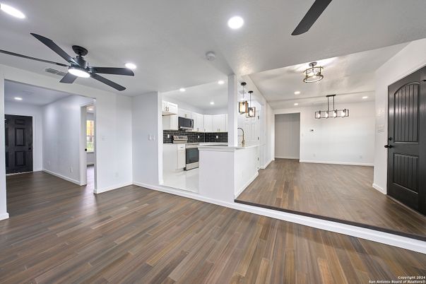 Chandelier, Interior, Kitchen, Pendant Lights, Recessed Lighting, Stainless Steel Appliances, Wood Texture Flooring