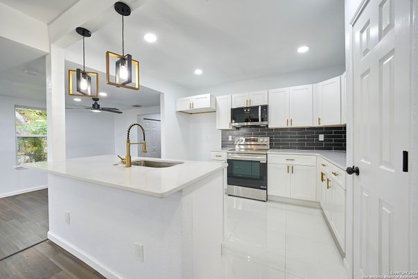 Interior, Kitchen, Pendant Lights, Recessed Lighting, Stainless Steel Appliances, Wood Texture Flooring