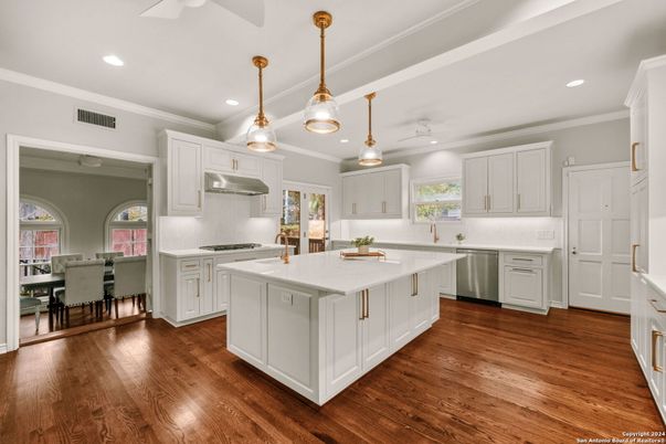 Dining room, Interior, Kitchen, Pendant Lights, Recessed Lighting, Stainless Steel Appliances, Wood Texture Flooring