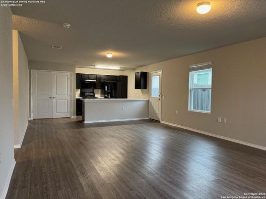 Empty room, Interior, Kitchen, Stainless Steel Appliances, Wood Texture Flooring