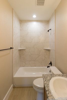 Bathroom, Interior, Marble Walls, Recessed Lighting, Wood Texture Flooring