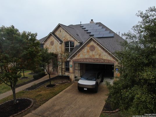 Attached, Exterior, Facade, Solar Panels, Brick Traditional