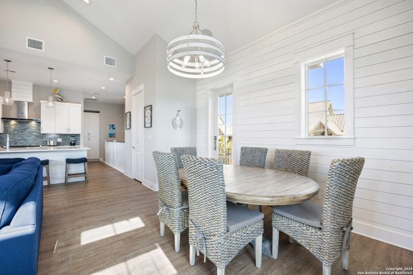 Dining room, Interior, Kitchen, Pendant Lights, Recessed Lighting, Stainless Steel Appliances, Wood Texture Flooring