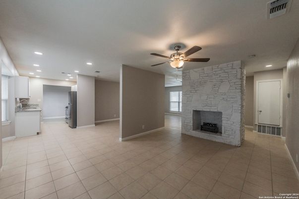 Empty room, Fireplace, Interior, Kitchen, Recessed Lighting, Stone Walls