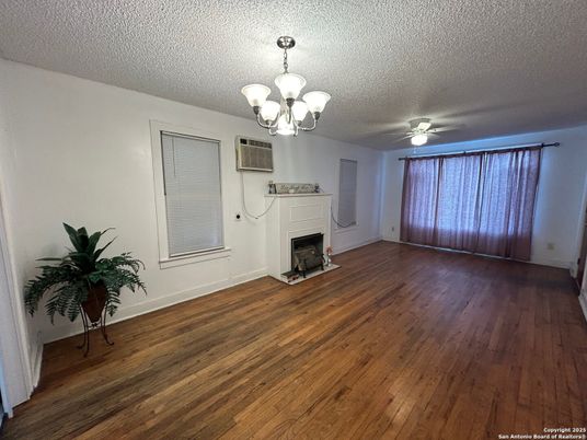 Chandelier, Empty room, Fireplace, Interior, Wood Texture Flooring