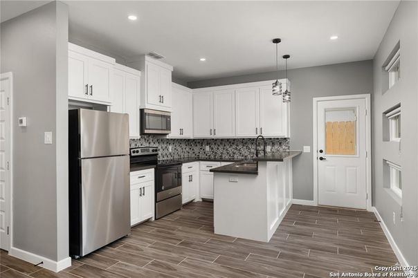 Interior, Kitchen, Pendant Lights, Recessed Lighting, Stainless Steel Appliances, Wood Texture Flooring