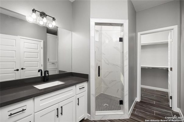 Bathroom, Glass Shower, Interior, Marble Walls, Wood Texture Flooring