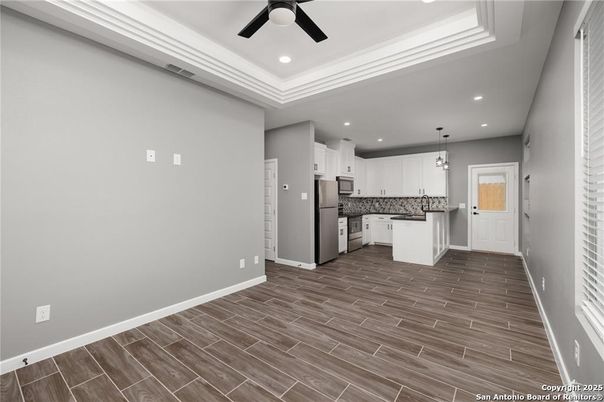 Interior, Kitchen, Pendant Lights, Recessed Lighting, Stainless Steel Appliances, Wood Texture Flooring