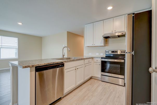 Interior, Kitchen, Recessed Lighting, Stainless Steel Appliances, Wood Texture Flooring