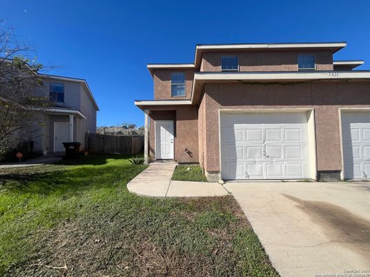 Attached, Exterior, Facade, Brick Facade, Modern