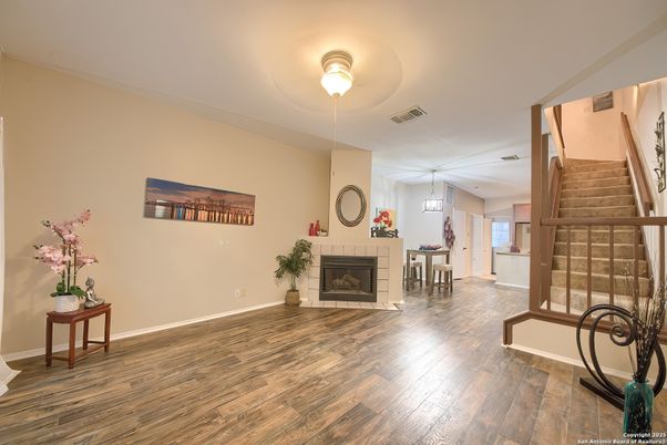 Dining room, Fireplace, Interior, Pendant Lights, Wood Texture Flooring