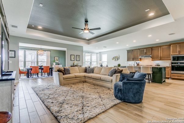 Dining room, Interior, Kitchen, Living room, Pendant Lights, Recessed Lighting, Stainless Steel Appliances, Wood Texture Flooring