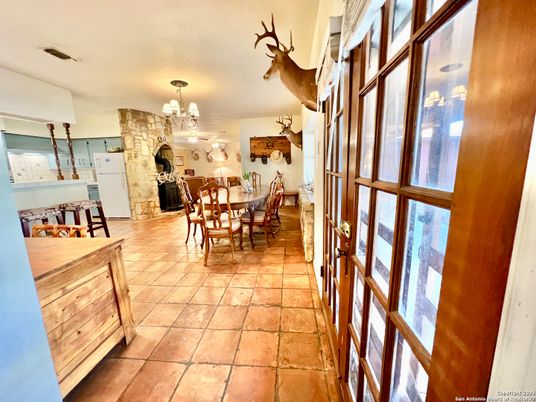 Chandelier, Dining room, Fireplace, Interior
