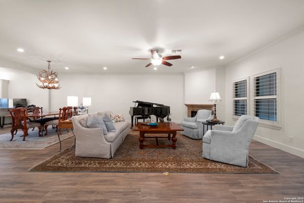 Chandelier, Dining room, Interior, Living room, Piano, Recessed Lighting, Wood Texture Flooring