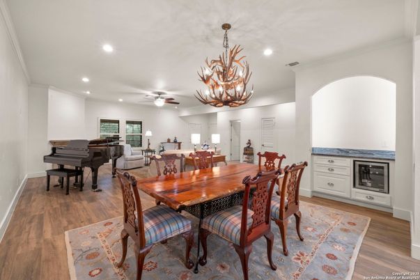 Chandelier, Dining room, Interior, Living room, Piano, Recessed Lighting, Wood Texture Flooring