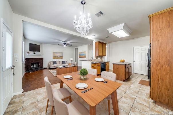 Chandelier, Dining room, Fireplace, Interior, Kitchen, Living room, Wood Texture Flooring