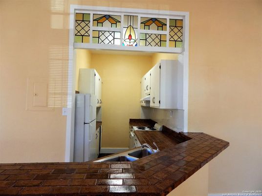Interior, Kitchen, Tile Countertops, Wood Texture Flooring