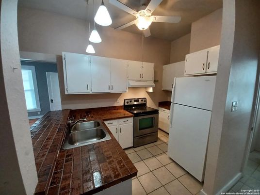 Interior, Kitchen, Pendant Lights, Tile Countertops