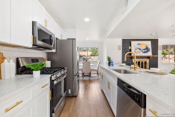 Dining room, Interior, Kitchen, Recessed Lighting, Stainless Steel Appliances, Wood Texture Flooring