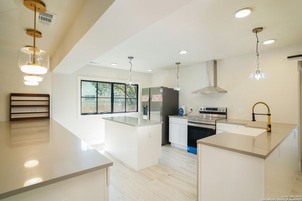 Interior, Kitchen, Pendant Lights, Recessed Lighting, Stainless Steel Appliances, Wood Texture Flooring