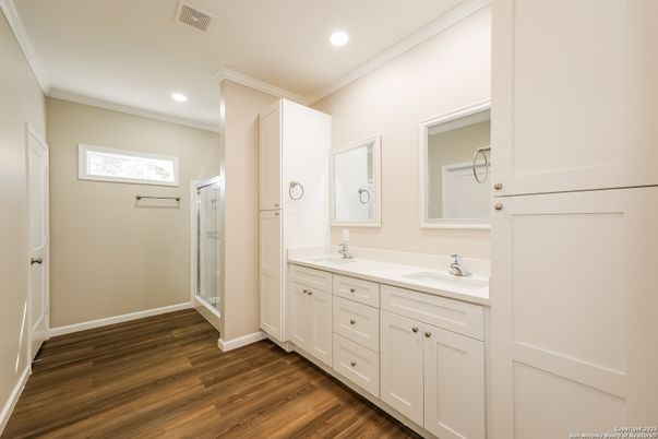 Bathroom, Dual Sink Vanities, Interior, Recessed Lighting, Wood Texture Flooring