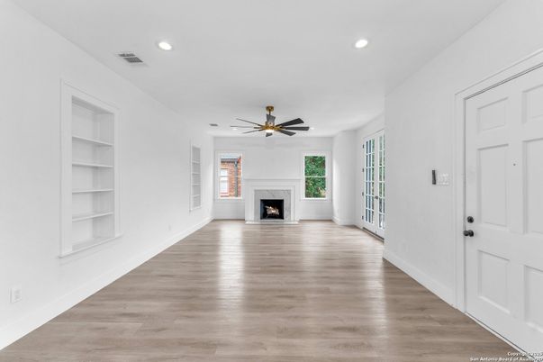 Empty room, Fireplace, Interior, Recessed Lighting, Wood Texture Flooring